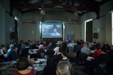 Audience watches A Degree of Justice oral history film at the Addressing Injustice symposium in March 2012. Photo by Don Erhardt